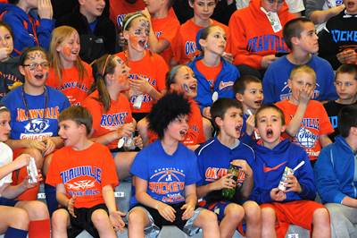 Okawville Junior High fans cheer on their Lady Rockets in the school's win over Christopher Elementary, Friday night, in the opening round of the 2013 Southern Illinois Junior High School Athletic Association championship basketball tournaments.