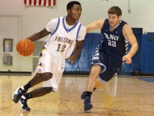 SIC’s Randell Pickett drives past Olney Central’s Brook Pampe. Pickett had a team-high 28 points and 11 rebounds in SIC’s 92-89 victory. 