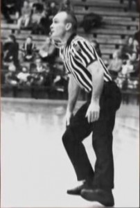 Ernie Reynolds in action as a veteran basketball official.