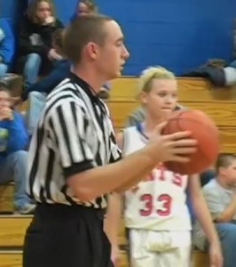 Cory Hastings officiating a junior high game when he first began officiating. 