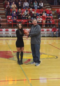 Morgan Griffith getting the 2,000 point ball being presented by long time West Frankfort coach Matt Hampleman
