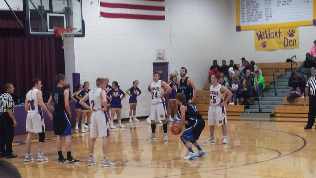 A trio of Sophmores for the Tigers- PG Tyson Kessler (23) at the free throw line, and Reed Raubach (11) and Anthoney Darge (21) in the post 