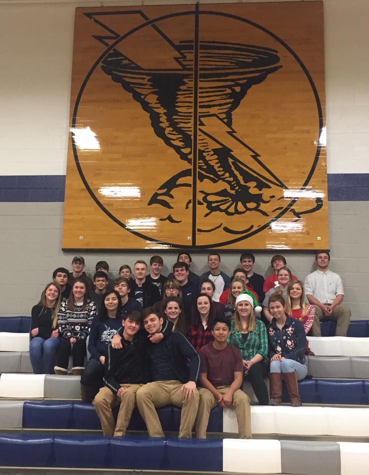 Tornadoes form both the girls and boys teams gather for a group photo last Saturday while serving the Seniors dinner in their community. (Photos courtesy of Randall Risley)  