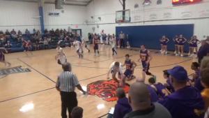 Tiger Freshman Corbin Fitch comes up from the steal as the tigers go on the break.  Thompsonville Tigers You Tube page  