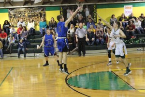 Tiger sophomore Reed Raubach jacks a three in a game down at Joppa two weeks ago.   (Samantha Sullivan-Thompsonville High School Boys Basketball Facebook  page.  Give her a call at 499-6465 if you need an event photographed.     