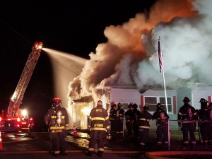 West Frankfort firefighters on the scene of the home on 1216 E Elm street in West Frankfort last night. (West Frankfort Gazette photo)