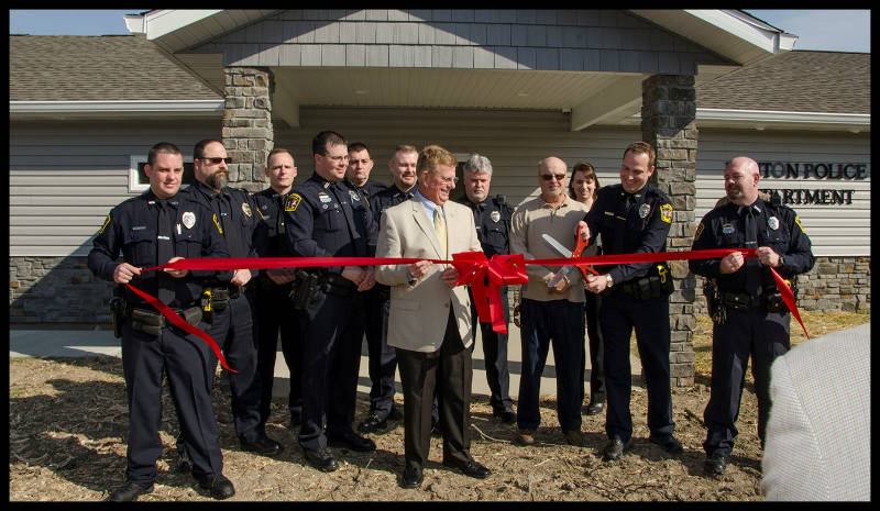 Benton Mayor Fred Kondritz cuts the ribbon for the opening of the new police station.  (David Cooper, photo) 