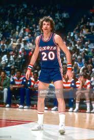 Doug Collins playing for the Philadelphia 76ers. He went on to coach the Chicago Bulls and as a color man for TNT on NBA broadcasts 
