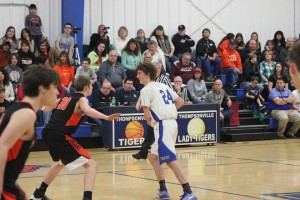 Thompsonville's Jared Payne at the point taking on Crab Orchard's Caleb Vaughn