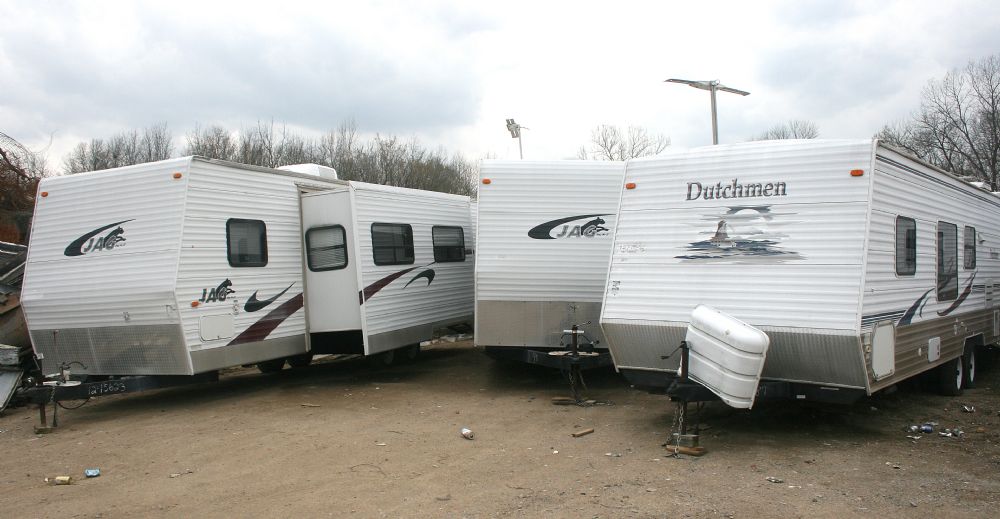 A few of several campers at a Sparta scrapyard waiting for demolition. (Randolph County Journal photo) 