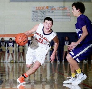 All State selection Seth Ramsey from Gallatin county drives around Eldorado's John Meredith. (Pontiac Daily Ledger photo) 
