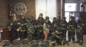 Taryan Ashli being proposed to by West Frankfort firefighter Matt Morthland 